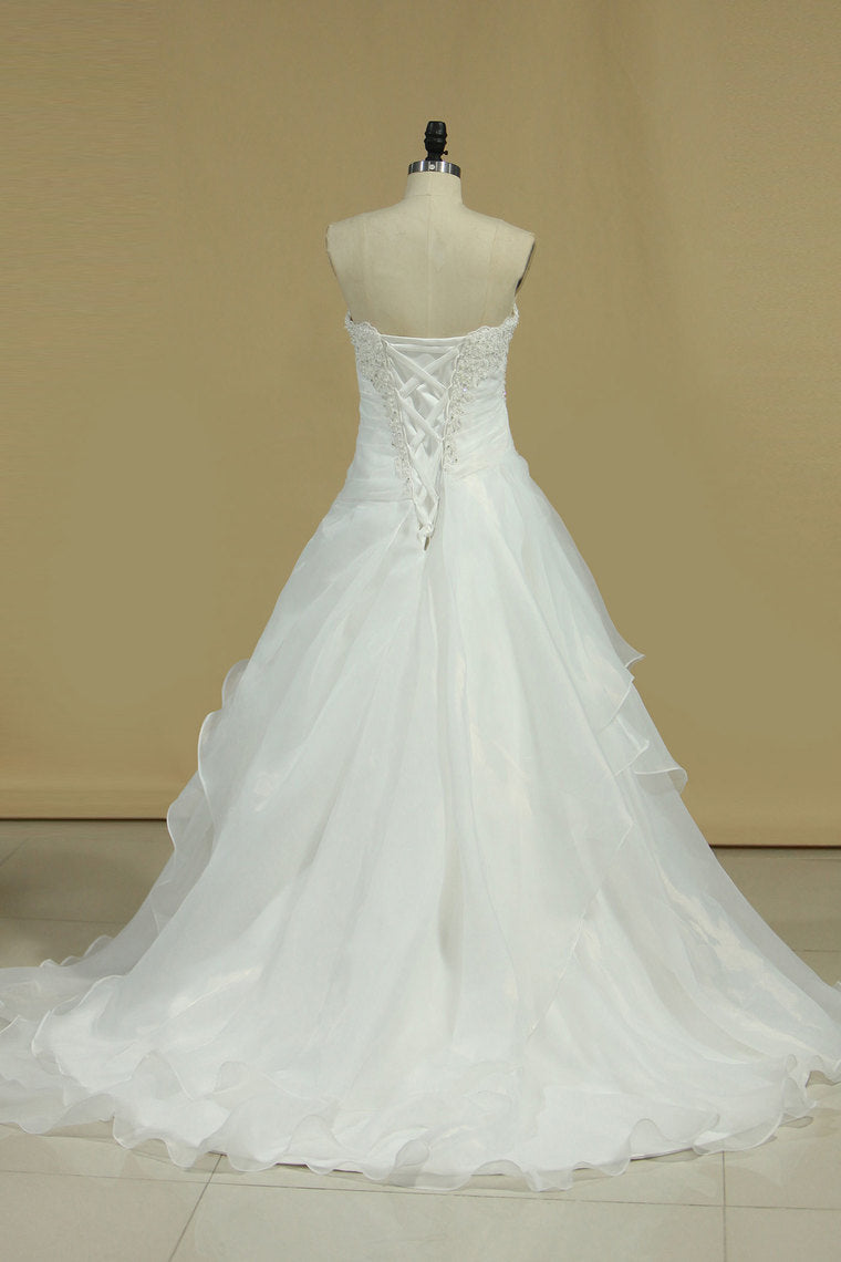 2024 A Line Sweetheart Organza Wedding Dresses With Beads And Ruffles